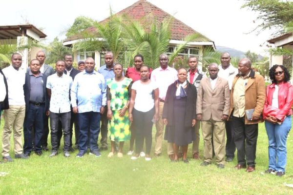 Prof. John Mosonik Chancellor of Rongo University with teachers and Board of Management members from Uswet and Kimawit schools during a sponsored retreat in Bomet County refined