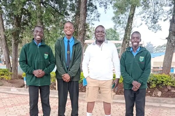 The Chesamisi High Principal Protus Ndombi with drama students. Photo by Kimtai