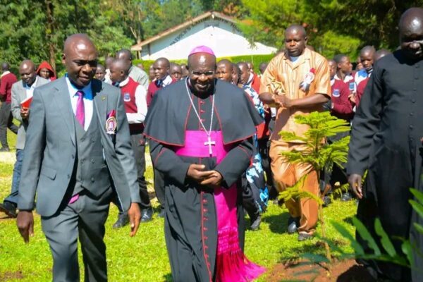 From left:.Patrick Naitiri Boys Chief Principal Samuel Barasa with Bishop Mark Kadima at Naitiri Boys'  School compound 