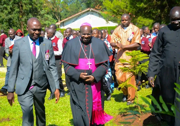 From left:.Patrick Naitiri Boys Chief Principal Samuel Barasa with Bishop Mark Kadima at Naitiri Boys'  School compound 