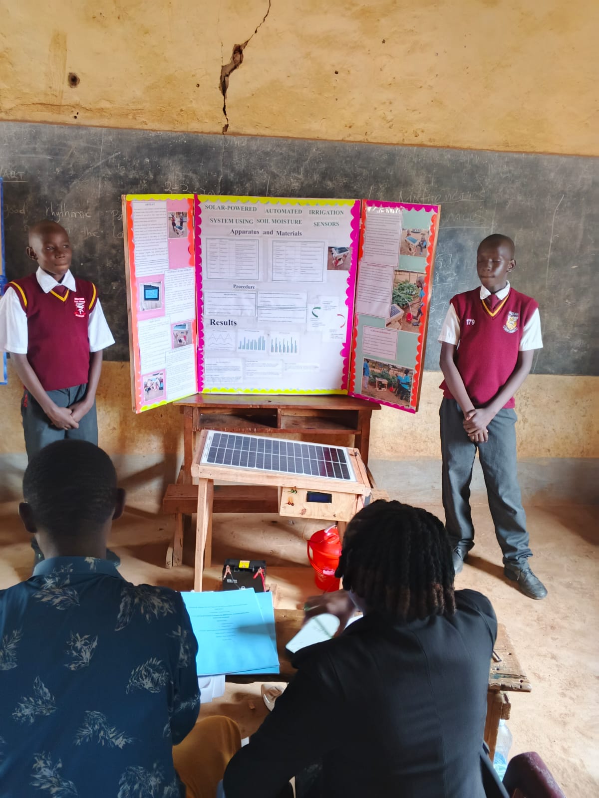Malivani AIC comprehensive school learners presenting their project; Solar powered automated irrigation system using soil moisture sensors at Kalulini boys secondary school.