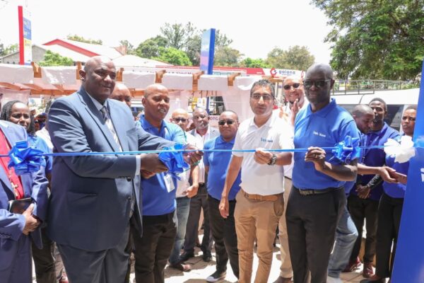 Former Makueni KESSHA chairman Julius Mutwii (l) presiding the opening of I&M banks branch in Wote-Makueni county