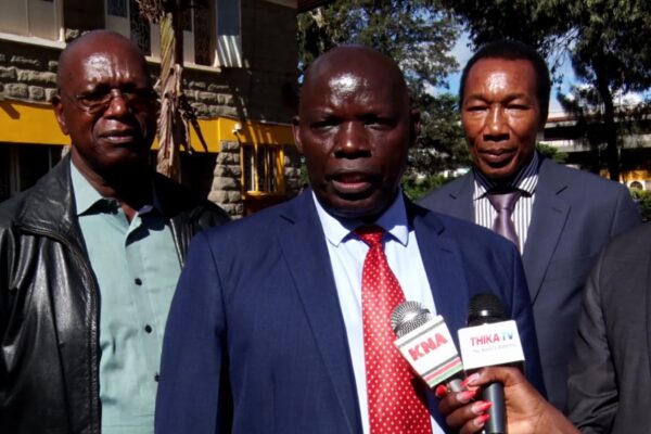 Thika High School Chief Principal Julius Muraya addressing the press in the school