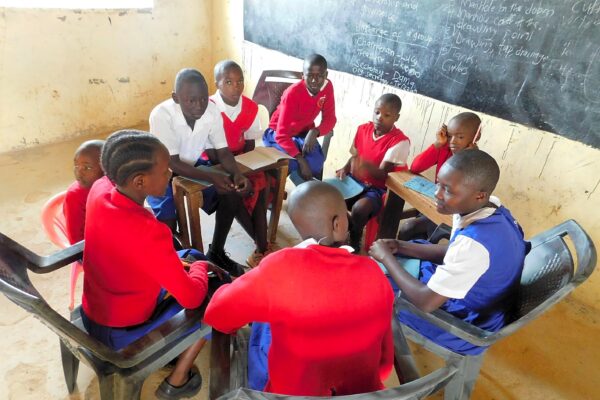 Students in a group discussion. Herd mentality affect their performance