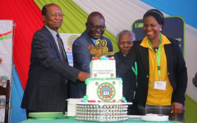 (From L-R) JKUAT Chair of Council, Dr. Micah Onsando; TVET Director, Archer Arina; former JKUAT Vice Chancellor, Prof. Nick Wanjohi; and Prof. Salome Bukachi of ISTQB cut a cake to commemorate JKUAT’s 20th Scientific, Technological and Industrialization Conference. Photo by Amos Kiarie