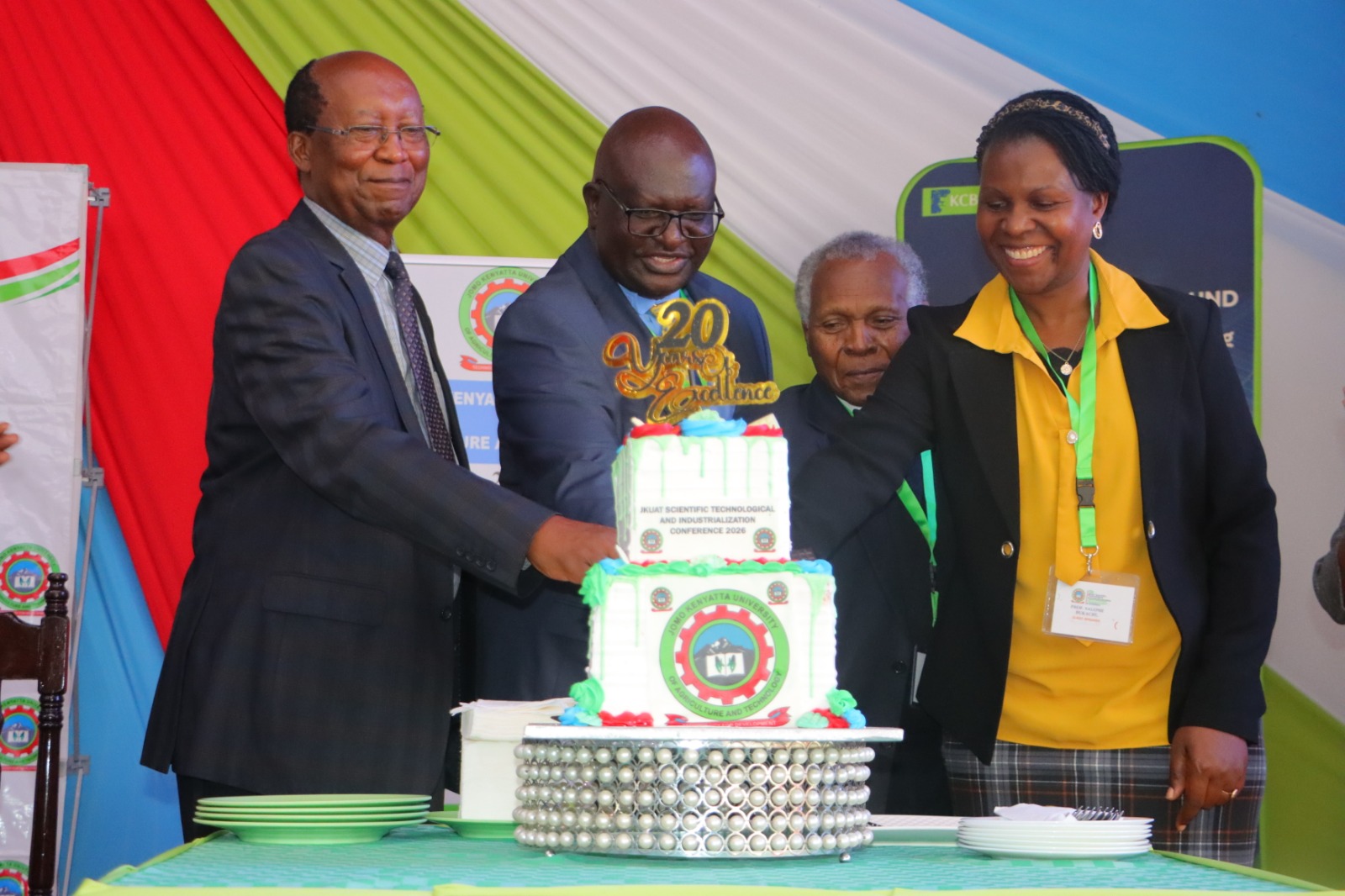 JKUAT turns to market-driven research to boost innovation and employability 2 (From L-R) JKUAT Chair of Council, Dr. Micah Onsando; TVET Director, Archer Arina; former JKUAT Vice Chancellor, Prof. Nick Wanjohi; and Prof. Salome Bukachi of ISTQB cut a cake to commemorate JKUAT’s 20th Scientific, Technological and Industrialization Conference. Photo by Amos Kiarie