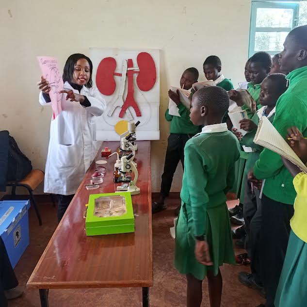 CEMASTEA official with learners from one pof the schools in Mt.Elgon in Bungoma County
