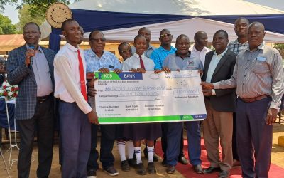 Matayos MP Geoffrey Odanga (with mic) during the bursary distribution