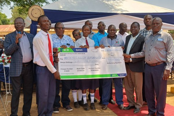 Matayos MP Geoffrey Odanga (with mic) during the bursary distribution