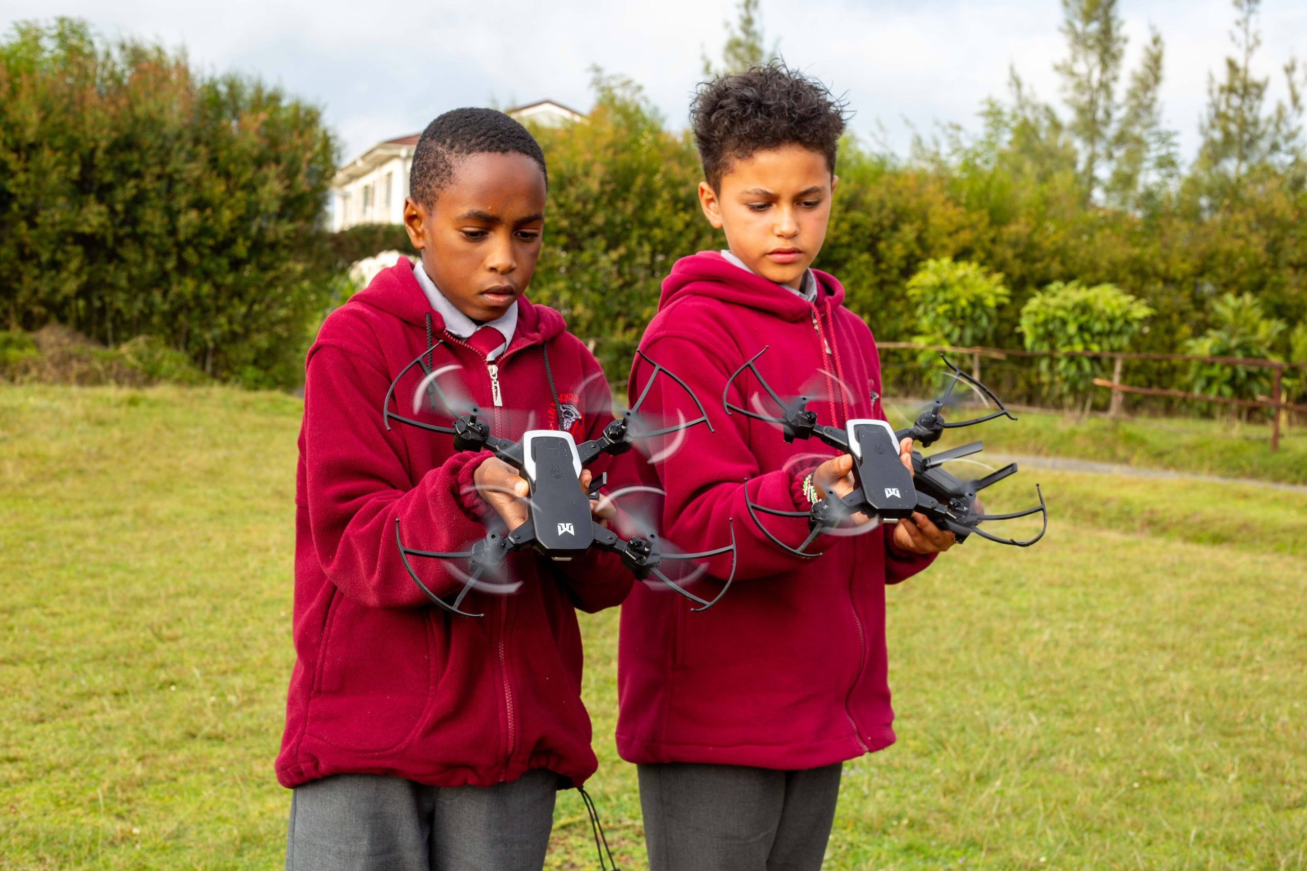 Beverly Schools-Kenya students displaying drones