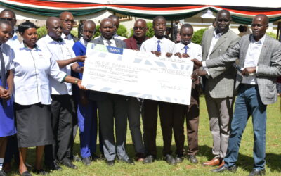 Far right: Baringo Central MP Joshua Kandie with NGCDF officials during the cheque release
