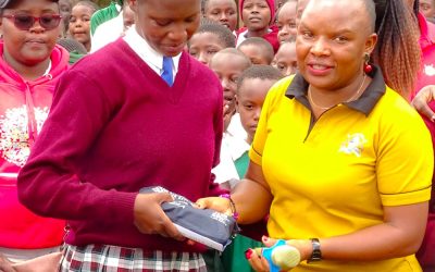 Trans Nzoia County CECM in charge of education Janerose Mutama during sanitary pads distribution.