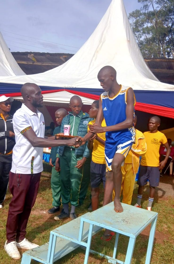Kitale School athletes receiving awards.