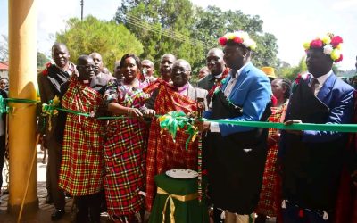PS Bitok and Joel Arumonyang launching the modern library at Chewoyet