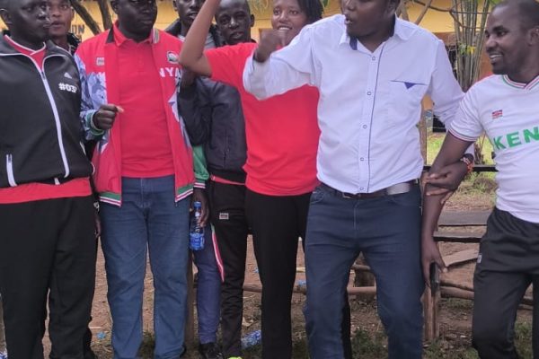 Narok KUPPET Branch Executive Secretary Saruni Tasur (in white shirt). The union has opposed the merger of schools owing to low enrollments.