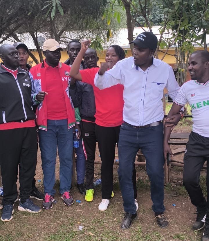Narok KUPPET Branch Executive Secretary Saruni Tasur (in white shirt). The union has opposed the merger of schools owing to low enrollments.