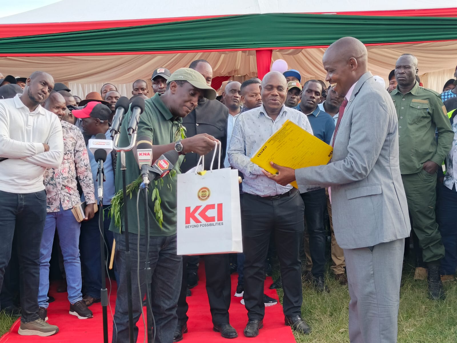 Narok Governor to sponsor trip for Rongena senior school candidates after delivering bus 2 Narok Governor Patrick ole Ntutu (left) hands over bus documents to Rongena Senior School Principal Paul Soi (right) during the official commissioning of the Sh10.5 million school bus funded by the Narok county government.