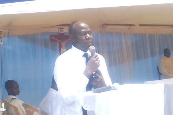 New headteacher Victor Ingosi addressing stakeholders during a thanksgiving Mass at Mukumu Primary School refined