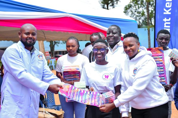 Health professionals and students provide free dental care and oral health education to residents during an outreach marking World Oral Health Day in West Pokot