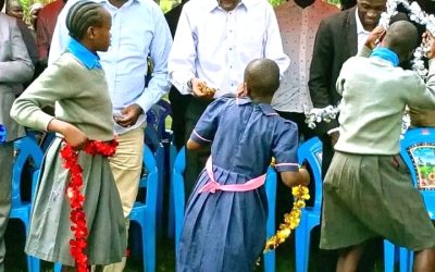 Basic Education Principal Secretary Julius Bitok inspecting condemned classrooms at Mayuge Primary School in Malava Constituency during an education development tour.