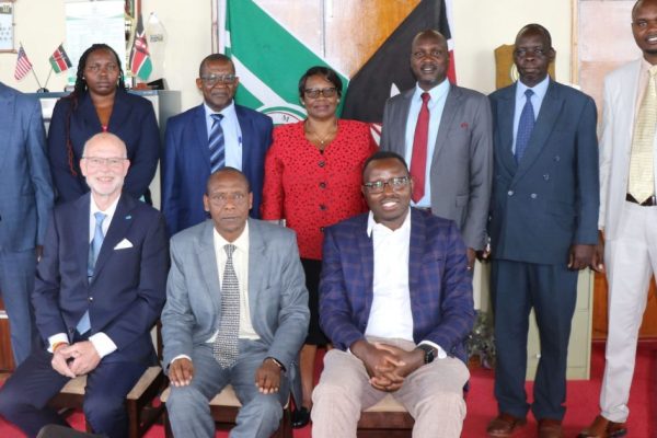 Moi University and Afriwatt Engineering Ltd officials.