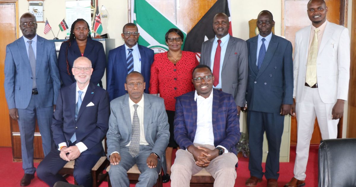 Moi University and Afriwatt Engineering Ltd officials.