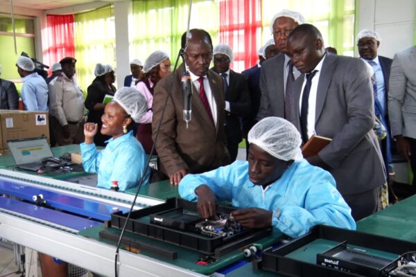 Cabinet Secretary for Information, Communication and Digital Economy William Kabogo during an inspection tour of the Jitume programme at Jomo Kenyatta University of Agriculture and Technology.