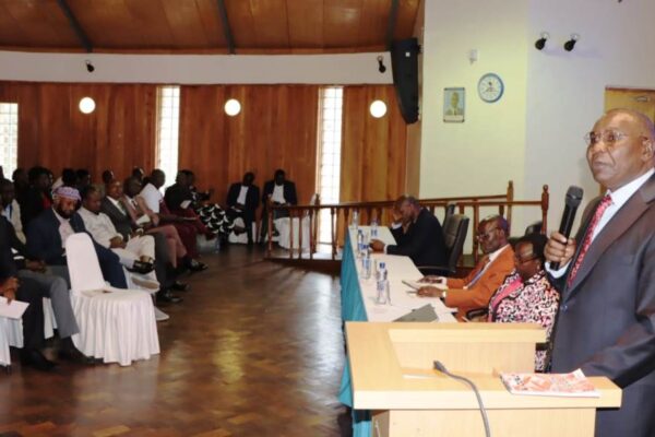 Chair of the Board of Governors at CEMASTEA, Dr. Pius Mutisya addressing INSET center principals and county trainers representatives on 16th April .Photo/Obegi Malack