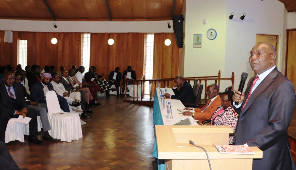 Chair of the Board of Governors at CEMASTEA, Dr. Pius Mutisya addressing INSET center principals and county trainers representatives on 16th April .Photo/Obegi Malack