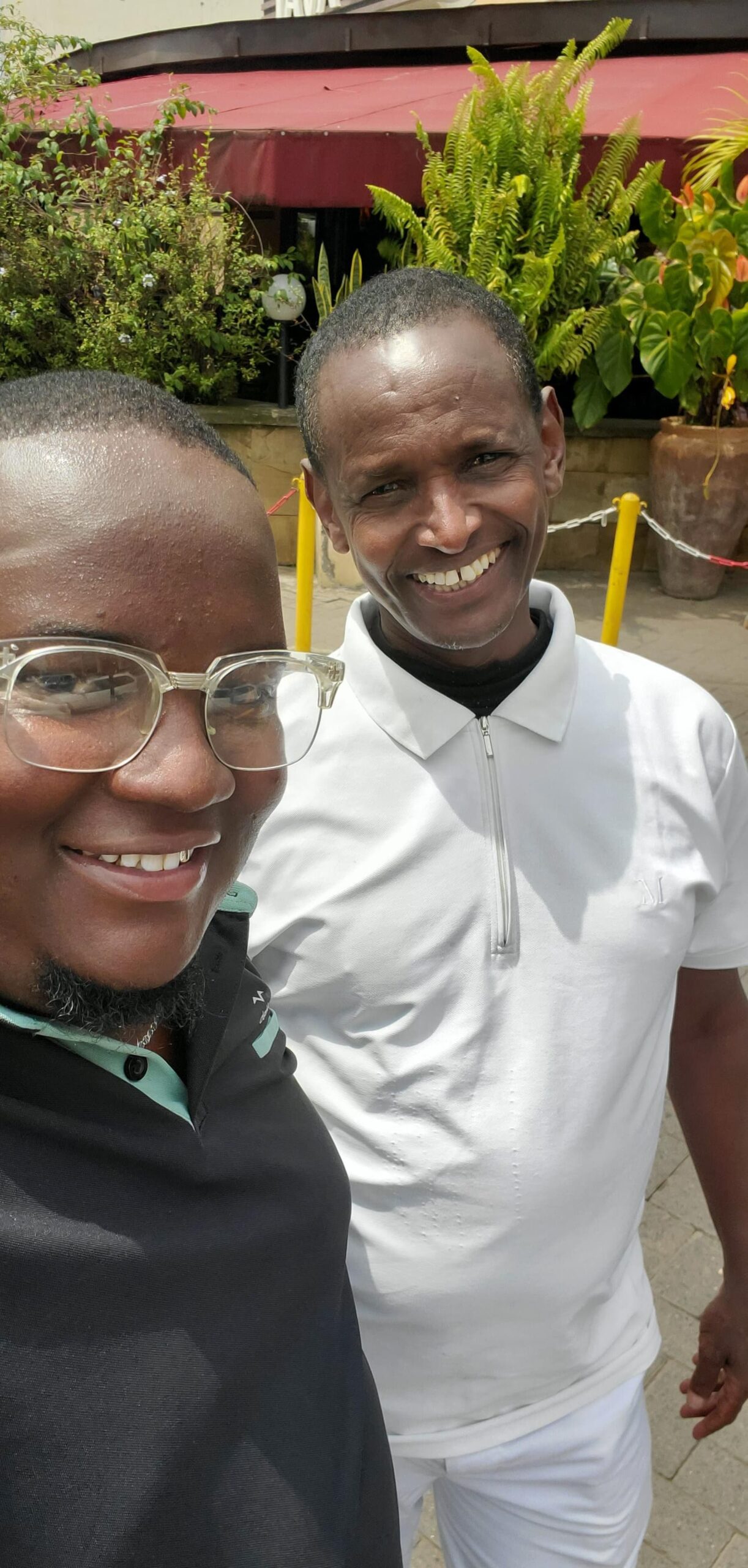 Former high school principal, Mario's Letelewa with former Solai High School student.