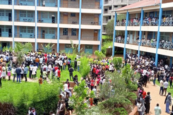 Students gathered outside the University of Kabianga after a lecture theatre scare that triggered panic and injuries, as emergency response and safety assessments continued.