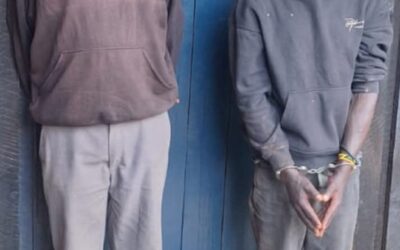 Suspects James Ngigi Ngendo (right) and James Mburi Chichu (left)after their arrest in connection with the abduction and murder of a nine-year-old boy in Githunguri.