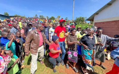 Kitutu Masaba MP Clive Gisairo(Centre in red) with Parents staff and pupils of Kenyerere Primary School during the commissioning of new modern Classrooms built by NG-CDF. Photo/Enock Okong'o