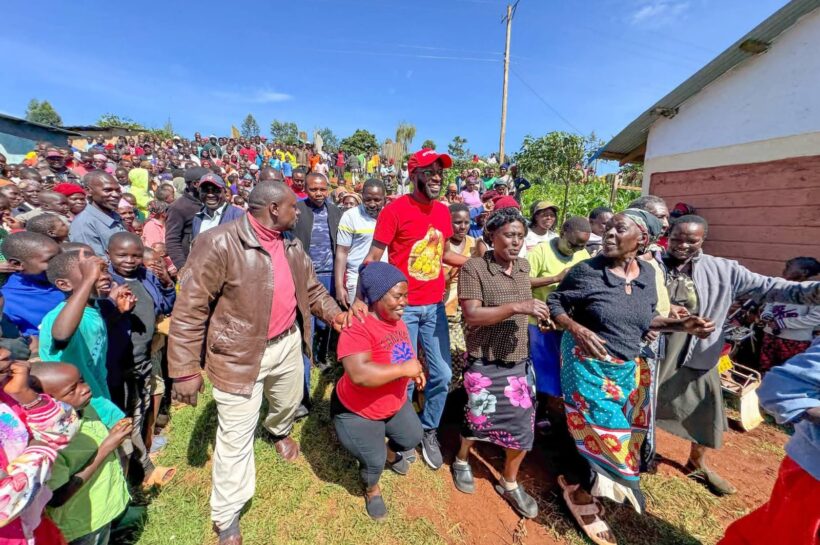 Kitutu Masaba MP Clive Gisairo(Centre in red) with Parents staff and pupils of Kenyerere Primary School during the commissioning of new modern Classrooms built by NG-CDF. Photo/Enock Okong'o