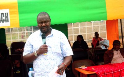 Samburu County Director of Education Abraham Kenei addressing parents at Kisima Girls Senior School in Samburu County during school AGM