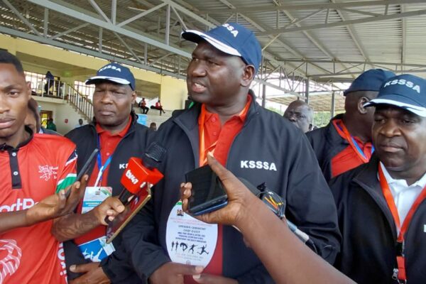 PS Bitok speaking during the 2026 National School Sports Championships at Mamboleo Stadium in Kisumu County, Bitok said the Ministry is working closely with the National Treasury to ensure capitation funds are in schools by the time learners resume on April 27.