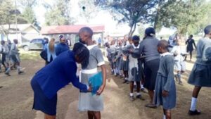 Teachers frisking learners beFore exams
