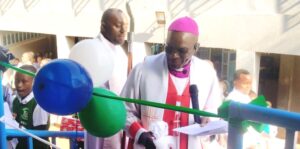 ACK Diocese of Makueni Bishop Francis Matui, Board of Management Chairman Bishop Emeritus Joseph Kanuku and Principal Onesmus Wambua during this year’s AGM at ACK St. Luke’s Wote Township Boarding Primary and Junior School.