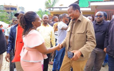 July Nyanchama consoles with Senator Onyonka,. Educators
