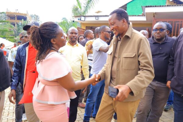 July Nyanchama consoles with Senator Onyonka,. Educators