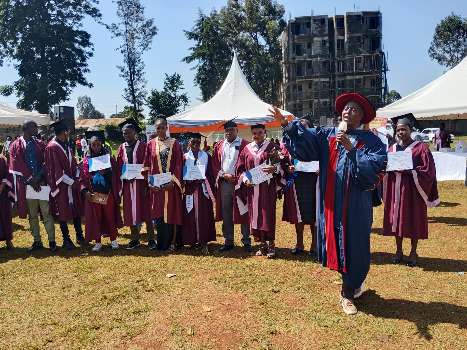 MP Machua Waithaka speaking during the graduation ceremony of the IYF short courses programme at the Ndumberi Stadium in Kiambu-Photo|Felix Njenga