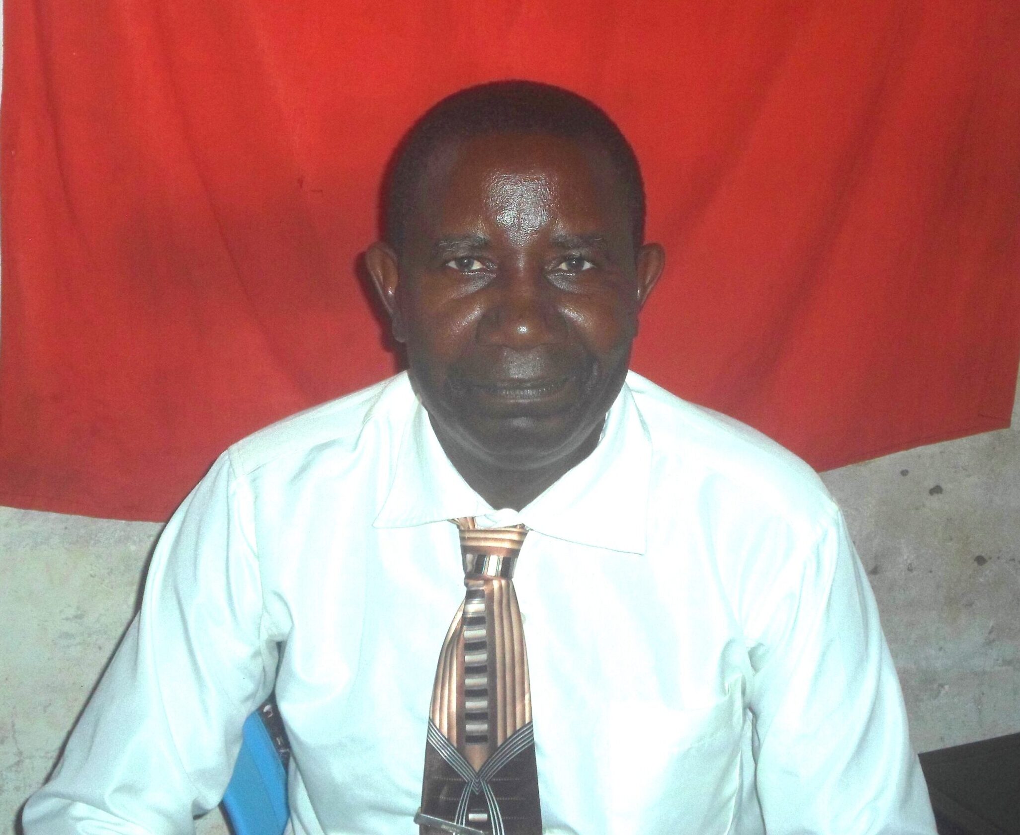 Anderson Kibigili Thinga speaking to education news at Langobaya sublocation in Malindi subcounty in Kilifi County Recently