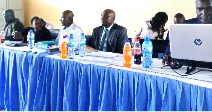 Mr. Yobes Magara centre with suit during the meeting refined
