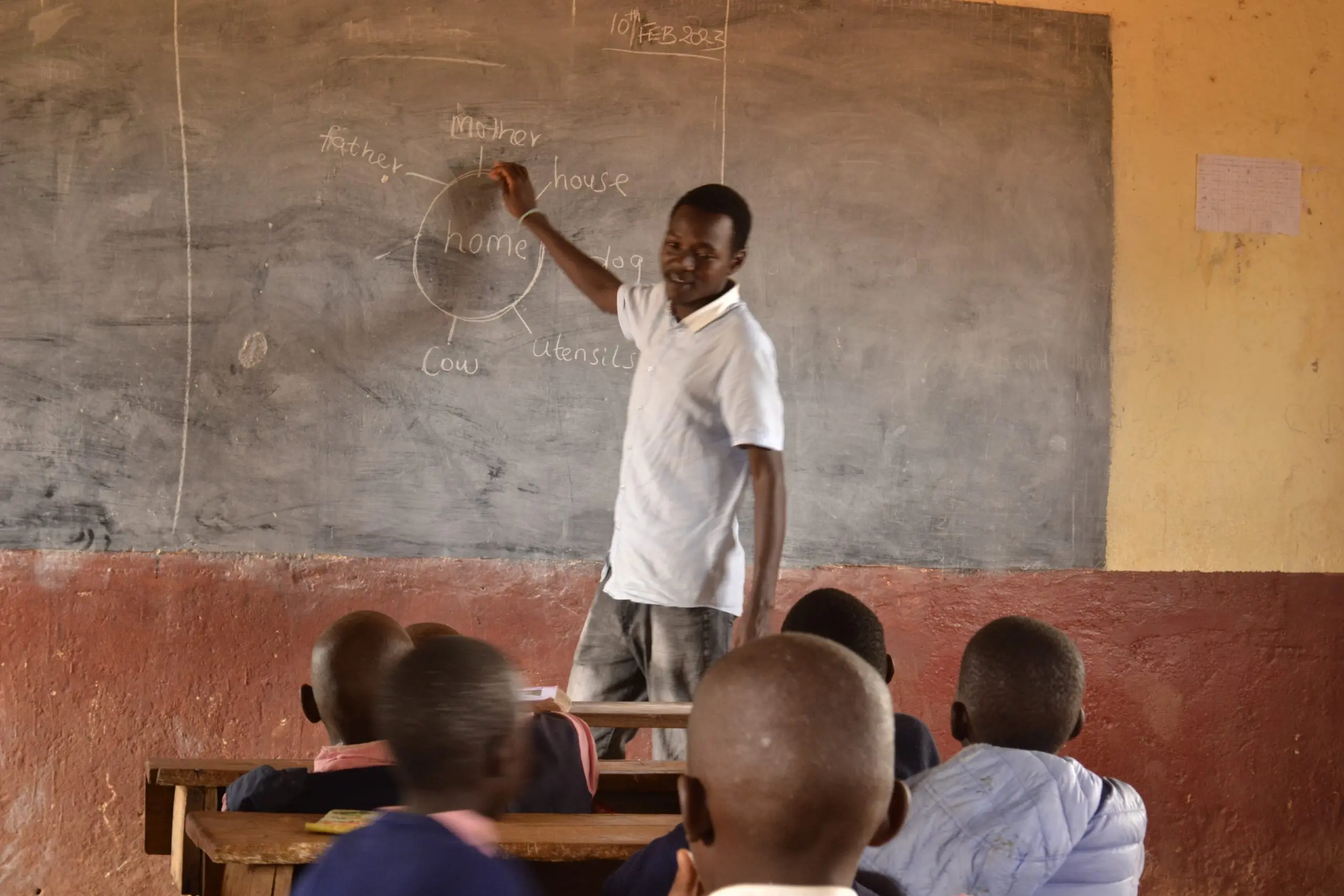 A young teacher in class during teaching practice