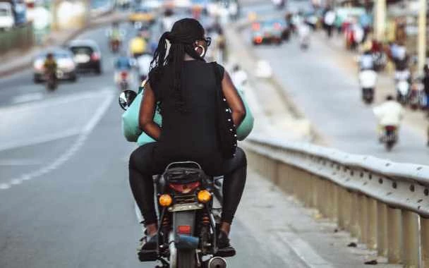 Student riding the Bodaboda
