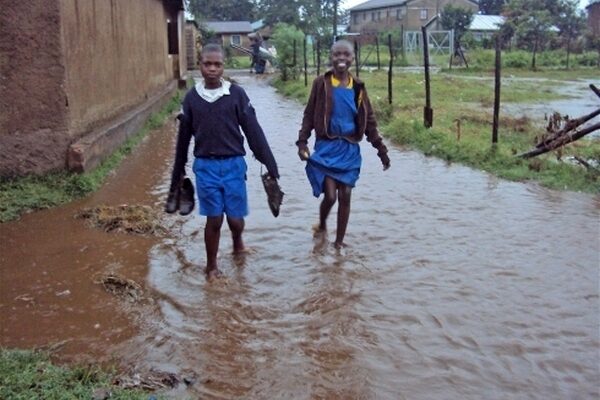 School children during rainfall