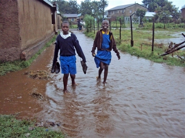 School children during rainfall