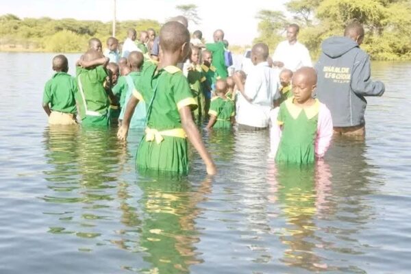 Learners in Baringo County wade water to school