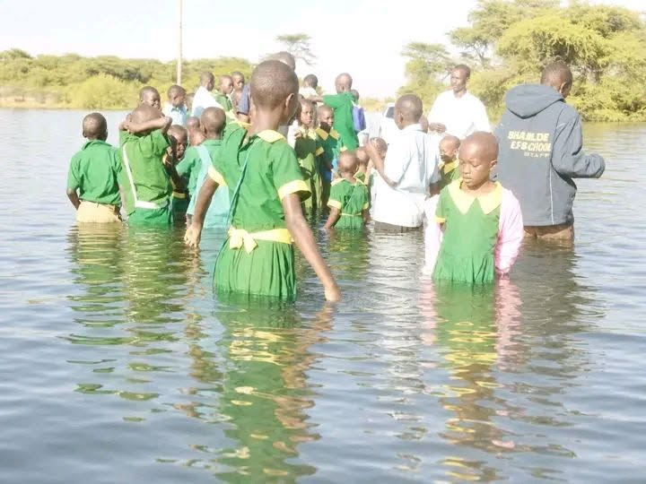 Learners in Baringo County wade water to school
