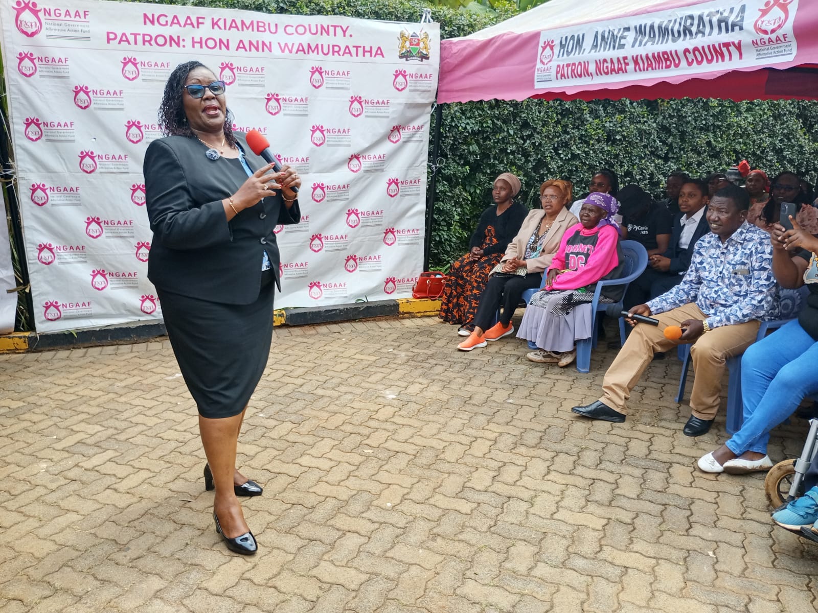 Ann Wamuratha, Kiambu Woman Representative addressing some parents. Photo Felix Wanderi